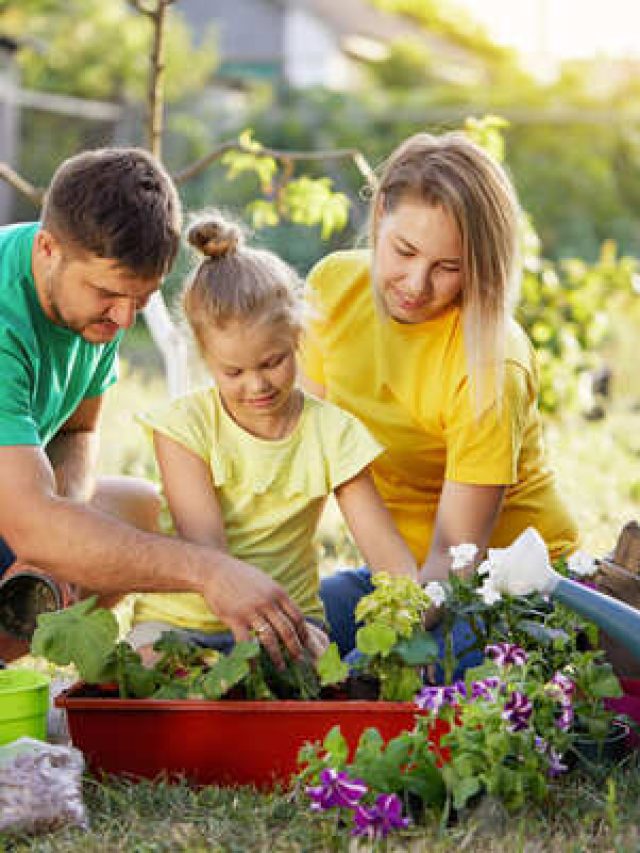 parents and kid gardening.