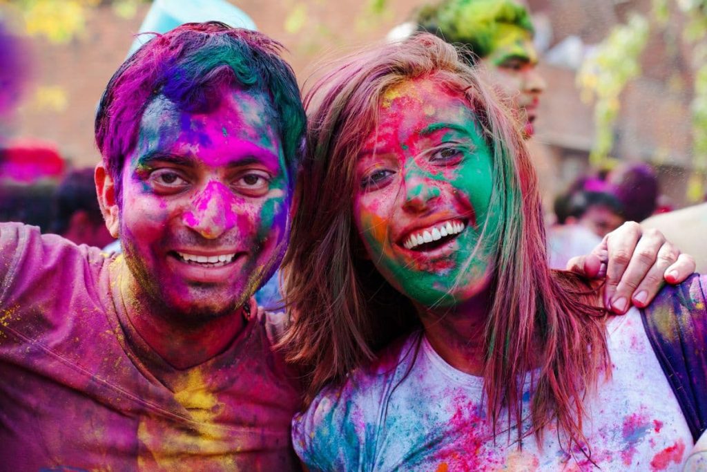 Delhi India MARCH 20 Tourist with students of Jawaharlal Holi in India.