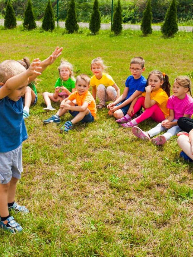 Group of kids playing family picnic games.