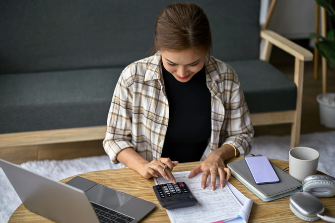 Women paying bills.