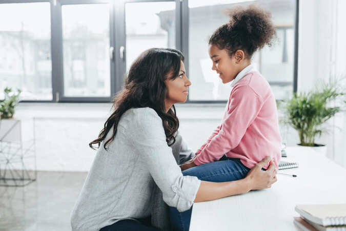 mother talking to her kid.